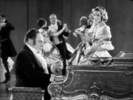 Waltzes from Vienna (1934)Edmund Gwenn and musical instrument